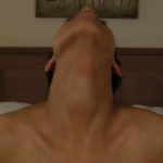 Person with head tilted back